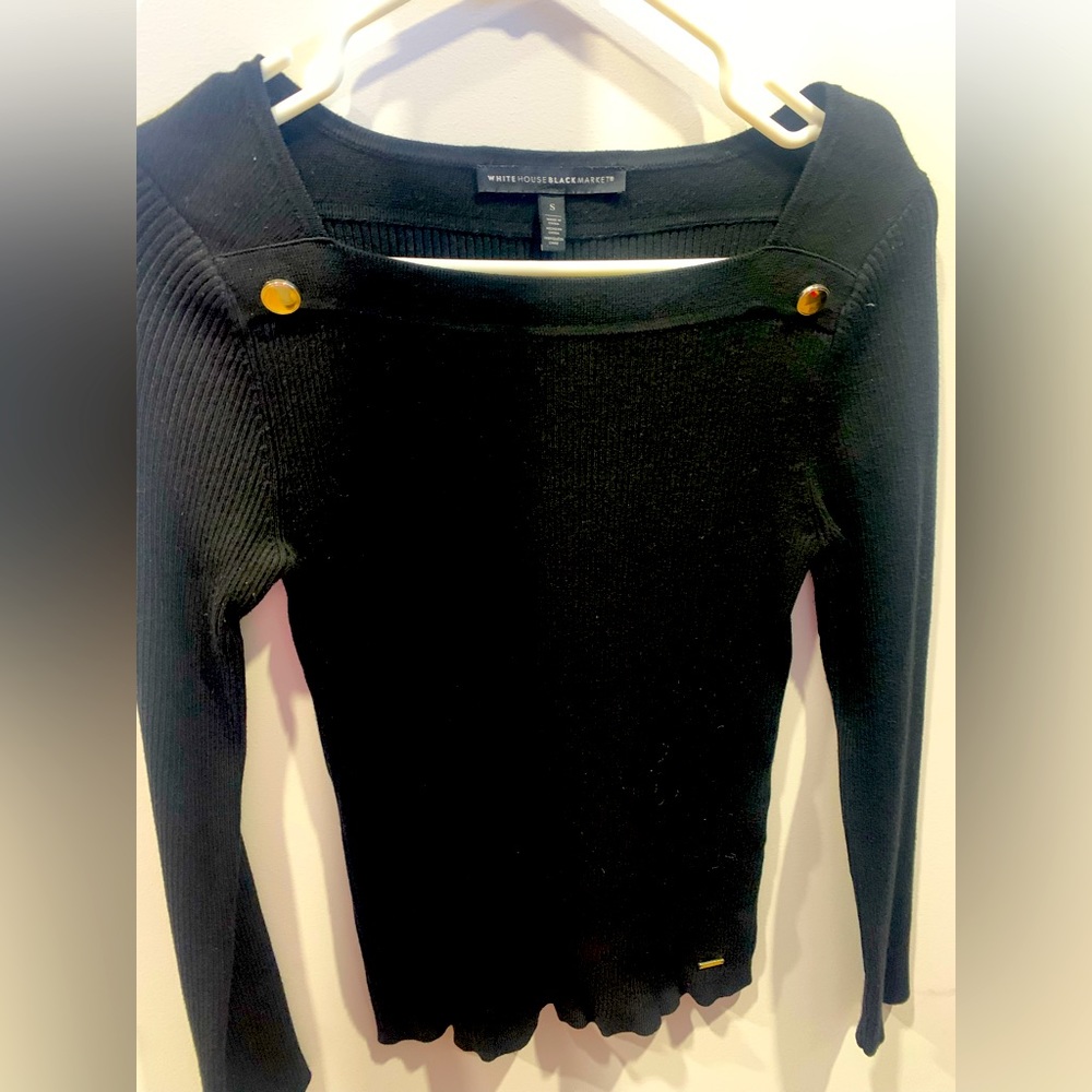 Women’s black long sleeve shirt with gold buttons on front